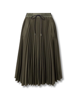 Green pleated skirt on a white background