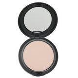 Compact powder in a black case with a mirror on a white background