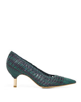 Green woven high heel shoe on a white background