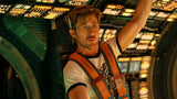 Person in a futuristic setting with high-tech equipment and lighting