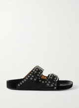 Black sandal with silver studs and buckles on a white background